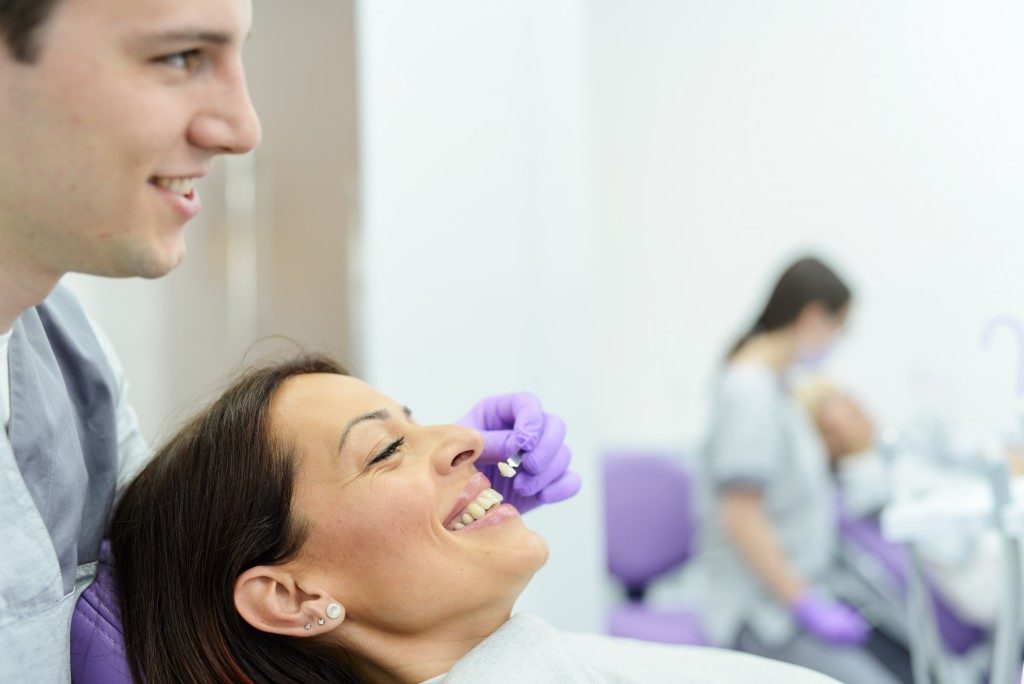 woman getting a dental implant
