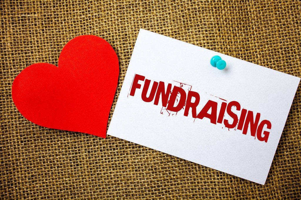 hand writing showing Fundraising